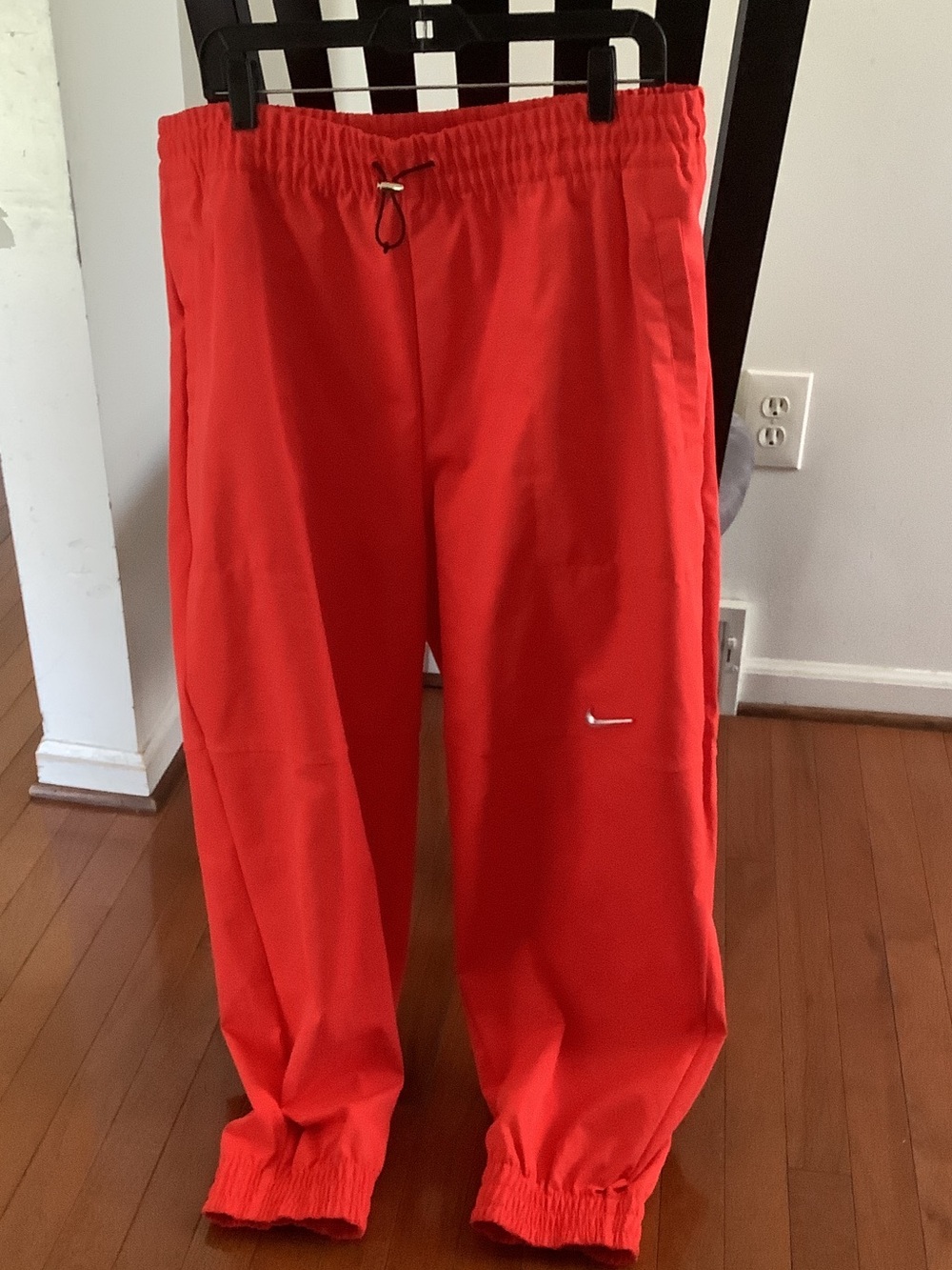 Nike Red Athletic Track Pants with White Swoosh